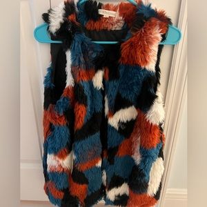 Coachella vibes! Fun faux fur vest for a fab time…music festival or concert!
